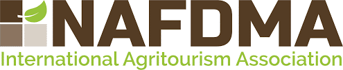 NAFDMA International Agritourism Association logo with green leaf symbolizing farming, growth, and sustainability.