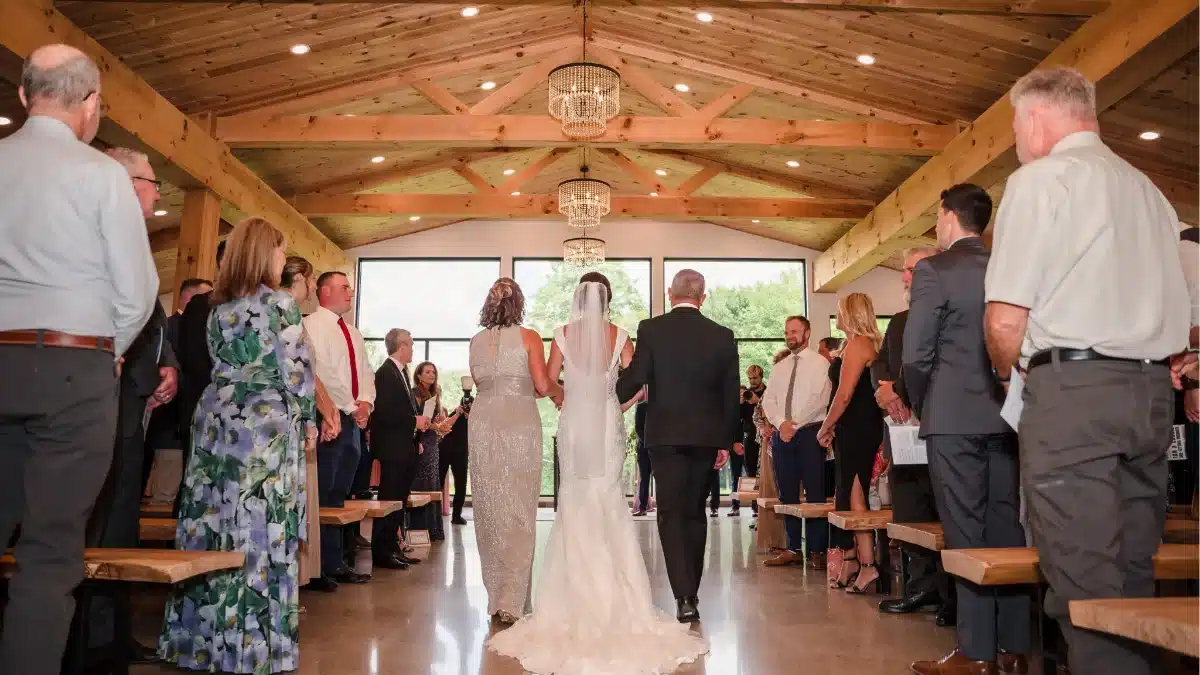 Couple walking trail at Standing Rock Farms during micro wedding golden hour portraits in Madison Ohio